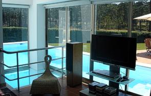 Livingroom with Swimming pool integrated into the building