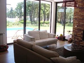 Living room with view to pool