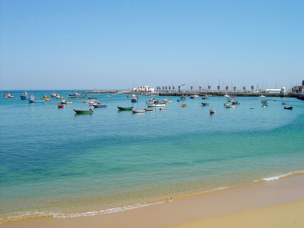 Ribeira beach with Cascais Marina in the background, Portugal